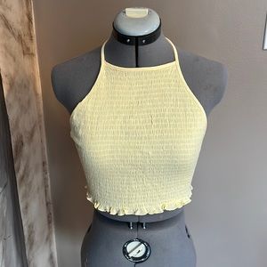 This cute yellow crop top is new and from Pacsun!